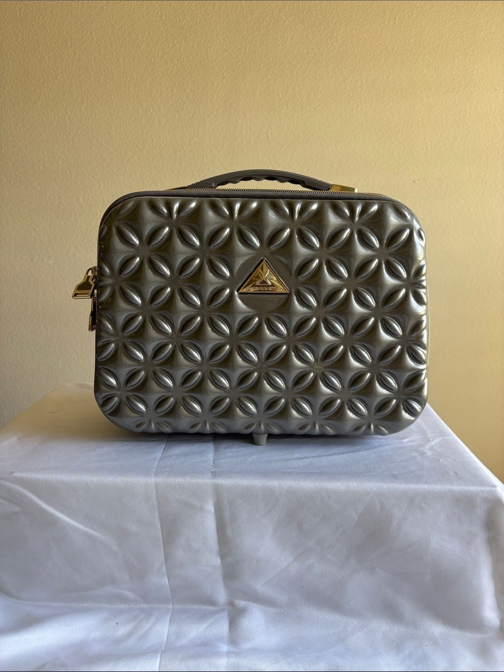 Metallic Gray Quilted Cosmetic Case with Gold Accents